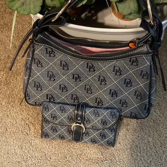 Dooney & Bourke Handbags - Dooney and Bourke Wallet. Excellent condition. Purse sold separately.